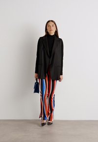 Marc Cain Leggings - Pantaloni - cranberry