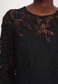 Marchesa Rosa Cocktailjurk - black