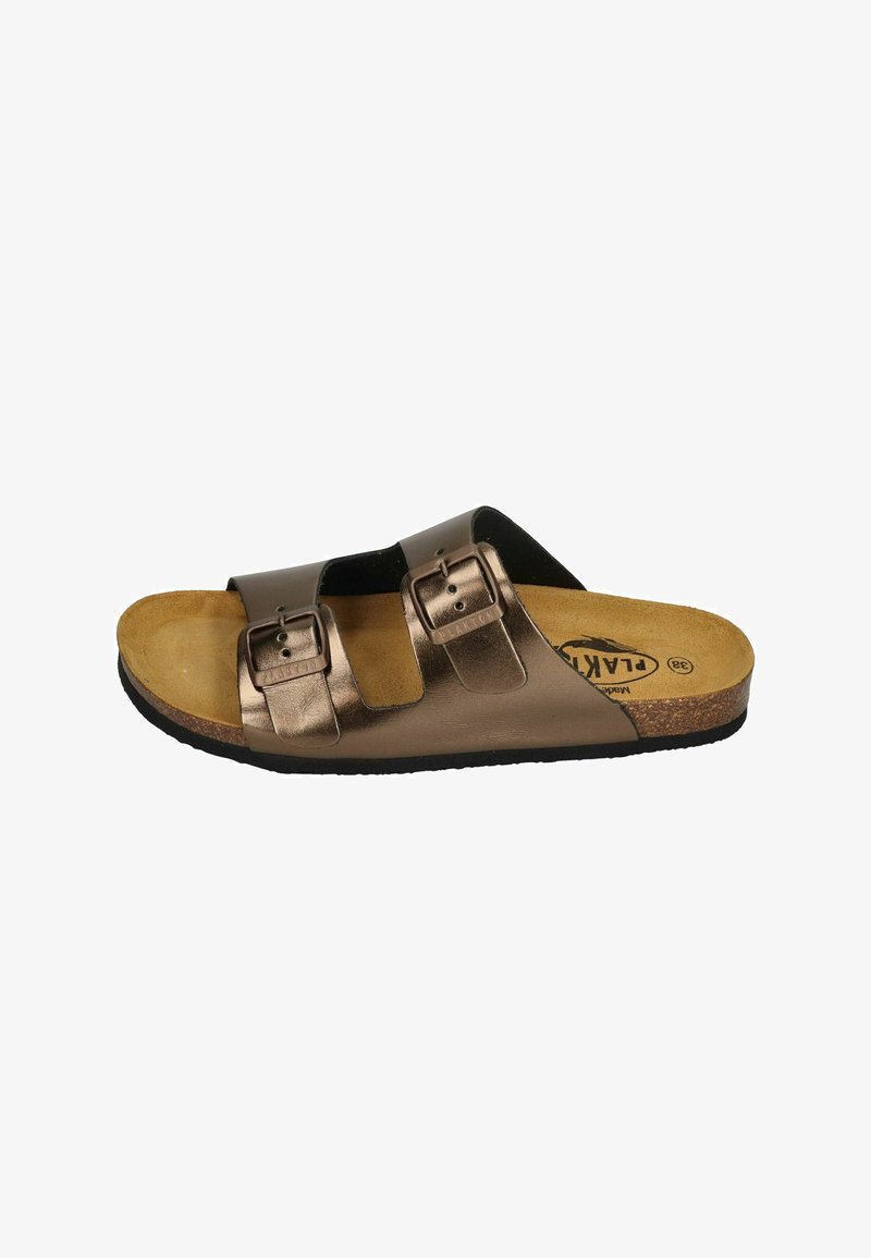 Two-strap slide sandal in metallic bronze with adjustable buckles, cork footbed, and black textured outsole. Flat sole for comfort.
