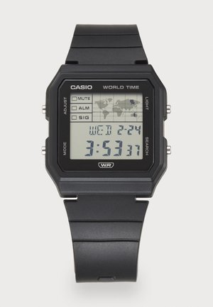 Relógio de pulso digital preto com display LCD, apresenta um mapa-múndi, hora, dia e data. Inclui botões para ajustar configurações e função de luz.