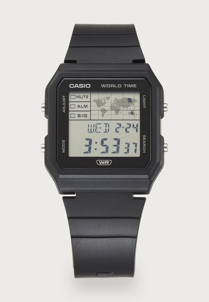 Montre numérique noire avec affichage LCD, affichant une carte du monde, l'heure, le jour et la date. Comprend des boutons pour ajuster les paramètres et la fonction d'éclairage.