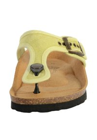 Sandal in tessuto giallo con plantare in sughero, cinturino regolabile con fibbia in metallo e suola in gomma. Il design include un sostegno per le dita dei piedi.