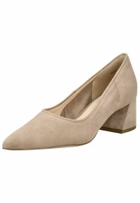 Pompe à talons hauts en suède beige avec un bout pointu et un talon carré. La tige présente une texture lisse et une silhouette épurée.