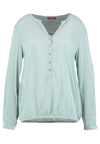 Blouse verte clair à manches longues avec un motif géométrique subtil, décolleté en V et patte de boutonnage. Ourlet froncé et texture de tissu douce.