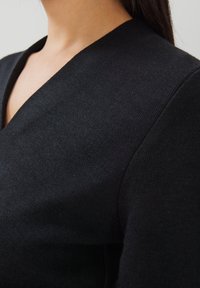 someday. Stickad tröja - black