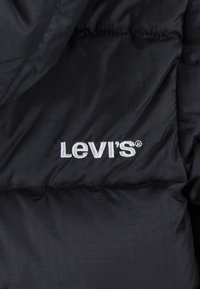 Levi's® CORE PUFFER - Vinterjacka - black