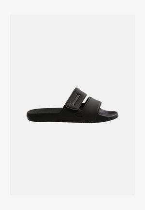 Schwarze Slip-On-Sandale mit zwei verstellbaren Riemen und strukturierter Innensohle, mit Havaianas-Logo auf dem oberen Riemen.