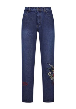 Blå denimjeans med en lige pasform, der har broderede designs på venstre ben og en subtil slidt tekstur. Mellemhøj talje.