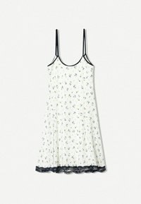 Bílá šaty s květinovým vzorem v zelené a modré. Špagetové ramínka s černou krajkou na lemu. Lehce materiál.