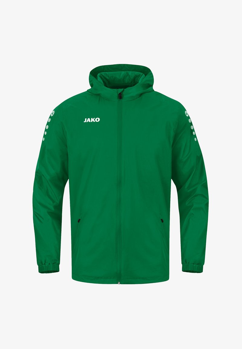 Giacca leggera verde con cappuccio, chiusura a zip frontale, polsini elastici e due tasche laterali. Presenta il logo JAKO e un accento a pois sulla manica.