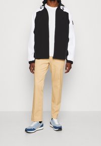 Calvin Klein Jeans Vindjacka - black