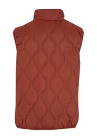 Quilted sleeveless vest in rich rust color, featuring a high collar and wavy stitching pattern for added texture.