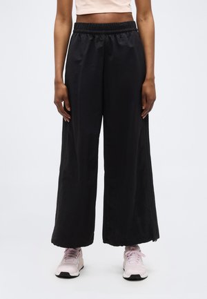 ICONIC WIDE LEG TRACKPANTS WITH BUNJEES - Pantalon de survêtement - black