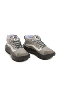 High-top hiking shoes in gray and beige with mesh and rubber materials, textured sole, black and white laces, and Vans branding.