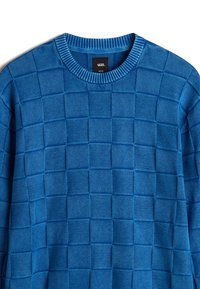 Blue textured sweater featuring a grid pattern, ribbed neck, and a medium size label. Made from soft fabric with a smooth finish.