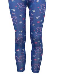 Legginsy z niebieskiego materiału z wzorem różowych kreskówkowych świń i kolorowych kwiatów. Materiał jest elastyczny; wzór pokrywa całą długość nóg.