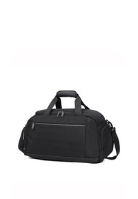Sac de sport noir en tissu avec une texture lisse, deux poignées, une bandoulière ajustable, des compartiments zippés et un détail de marque discret.