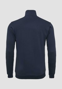Marineblauwe pullover sweatshirt met een hoge kraag, lange mouwen en een stevige textuur. Heeft een aansluitende taille en manchetten voor een gestroomlijnde silhouet.