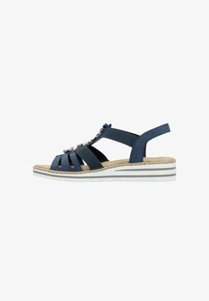 Marineblaue Sandalen mit einer flachen, weiß gestreiften Sohle, offener Zehenpartie und Perlenakzenten am Riemen. Verfügt über verstellbare Knöchelriemen.