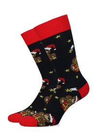Czarne skarpety z czerwonymi mankietami i palcami, z rysunkowymi niedźwiadkami w czapkach Mikołaja, pudełkami prezentowymi i gwiazdkami. Wykonane z miękkiego materiału.