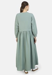 Modanisa MODEST - BENIN - Maxi šaty - green