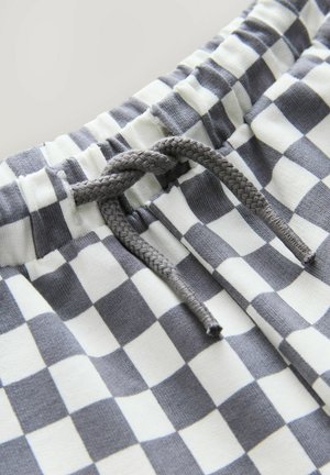 Katoenen shorts met een geruit patroon in grijs en wit, voorzien van een elastische tailleband en grijze trekkoorddetails.