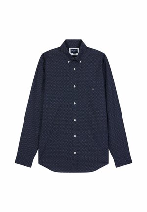 Chemise bleu marine à manches longues avec un motif géométrique subtil, dotée d'une poche poitrine. Elle présente des boutons blancs et un col classique.