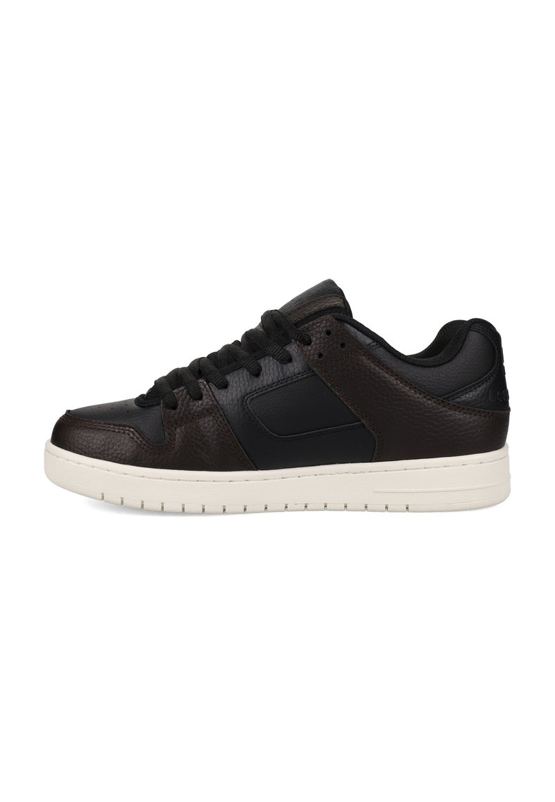 Black leather sneaker with textured brown accents, lace-up design, round toe, and a white rubber sole. Features subtle branding on the heel.