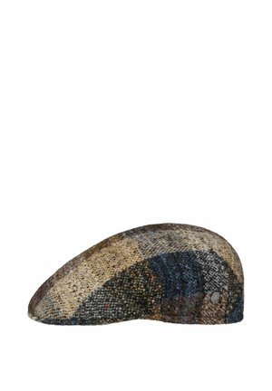 Flat woolen cap with a patchwork pattern in beige, brown, blue, and gray tones, featuring a small round metal brand emblem.