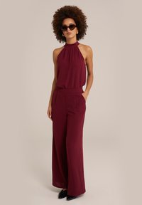 WE Fashion Auduma bikses - red