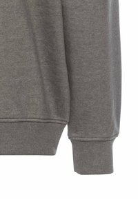 Grå sweatshirtstof med en blød tekstur, ribbede manchetter og et afslappet design. Kendetegnet ved sin afdæmpede farve og enkle silhuet.