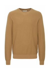 Suéter de punto beige con cuello redondo, puños y dobladillo acanalados. Presenta un patrón texturizado, hecho de material suave.