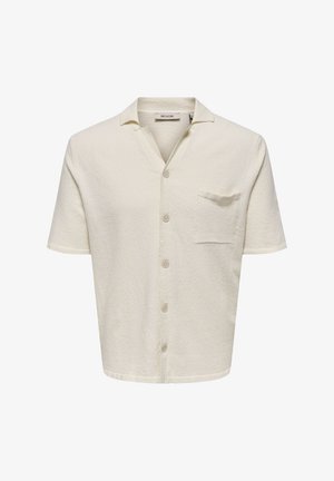 Short-sleeve button-up shirt in off-white, textured fabric. Features a pointed collar and a chest pocket with a single button closure.