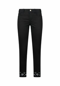 Pantalon noir ajusté avec design à cinq poches et ornements floraux argentés le long de l'ourlet inférieur.