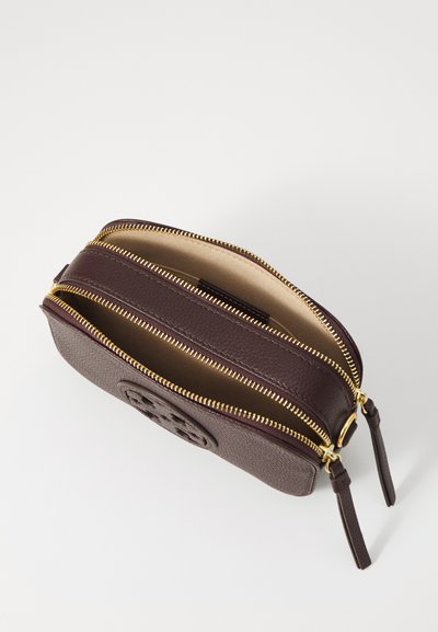 Dark brown leather zip pouch with two compartments, gold-tone zippers, and textured finish. Features embossed logo on the front.