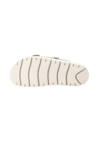 Suela de zapato blanca de goma con agarre texturizado, que presenta estrías horizontales y patrones circulares para mayor tracción. Marcaje de tamaño visible.