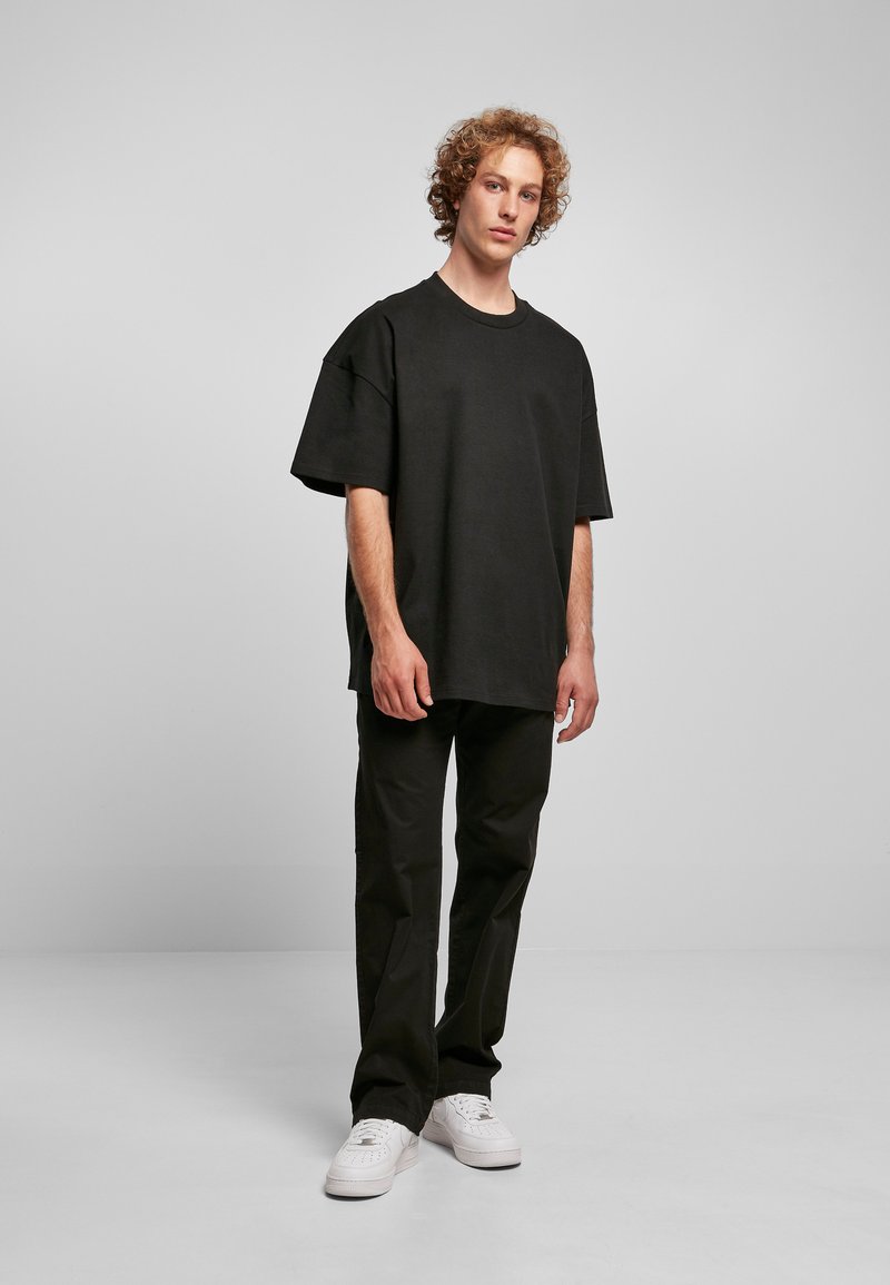 T-shirt con stampa Oversized Fit - Beige/pois - UOMO | H&M IT