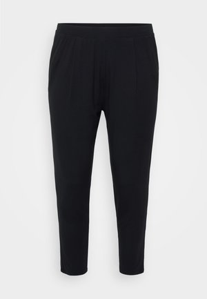 Calças pretas com um ajuste descontraído, cintura elástica e pregas subtis. Feitas de um tecido suave, apresentam pernas estreitas e sem bolsos.