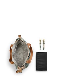 Linned canvas tote taske med grøn blomsterdesign på ydersiden, brune stropper og mønstret grå foring. Inkluderer to stropattachment og en sort pouch.