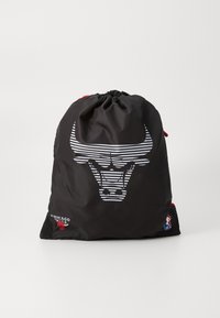 Black drawstring bag made of durable material featuring a striped bull logo and red accents, with a small logo on the side.
