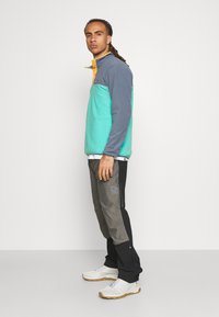 Norrøna TRAINING PANTS - Calças para exterior - caviar/dark grey melange