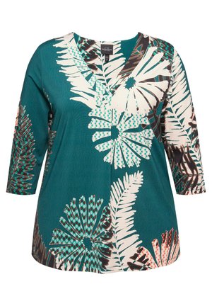 Tunica teal con scollo a V, caratterizzata da un motivo floreale in bianco e turchese. Maniche lunghe, tessuto morbido e vestibilità comoda.