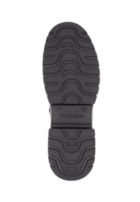 Semelle en caoutchouc noire avec une surface texturée, présentant des motifs de bande de roulement ondulés et l'empreinte "37 REVOLUTION."