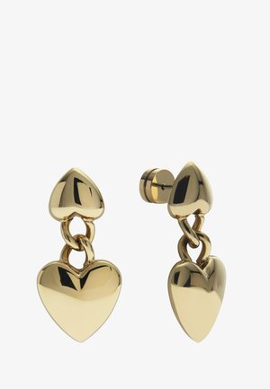 Orecchini in metallo tono oro con design a forma di cuore e dettaglio a catena collegata. Finitura liscia e lucida con chiusura a perno.
