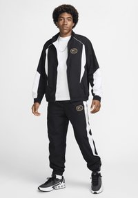 Nike Sportswear AIR - Skraistė  - black white metallic gold