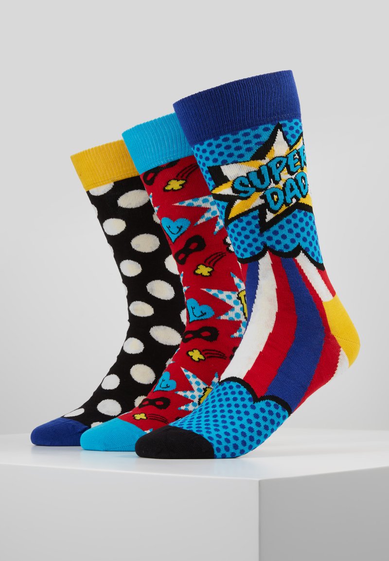 Three pairs of colorful socks: black with white polka dots, red with hearts and masks, blue with a "Super Dad" graphic. Multiple textures.