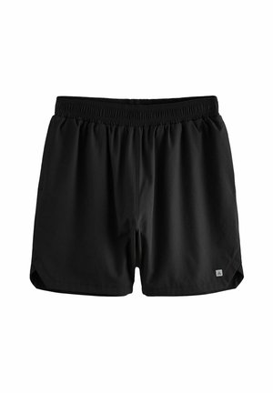 Sorte træningsshorts lavet af letvægtsstof. Har en elastisk talje og sidelommer. Kanten har en let kurve ved kanterne.
