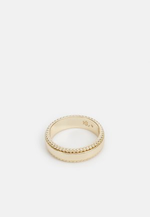 Gouden ring met een gladde middelste band, geaccentueerd door kralen details aan beide randen. Strak ontwerp met een gepolijste afwerking.