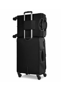 Conjunto de maletas negras que incluye una maleta con ruedas, un mango telescópico y un compartimento superior. Fabricada con un material duradero y con ruedas suaves.