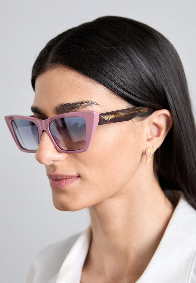 Pink rectangular sunglasses with gradient lenses, featuring a tortoiseshell pattern on the temples and gold accent detail.